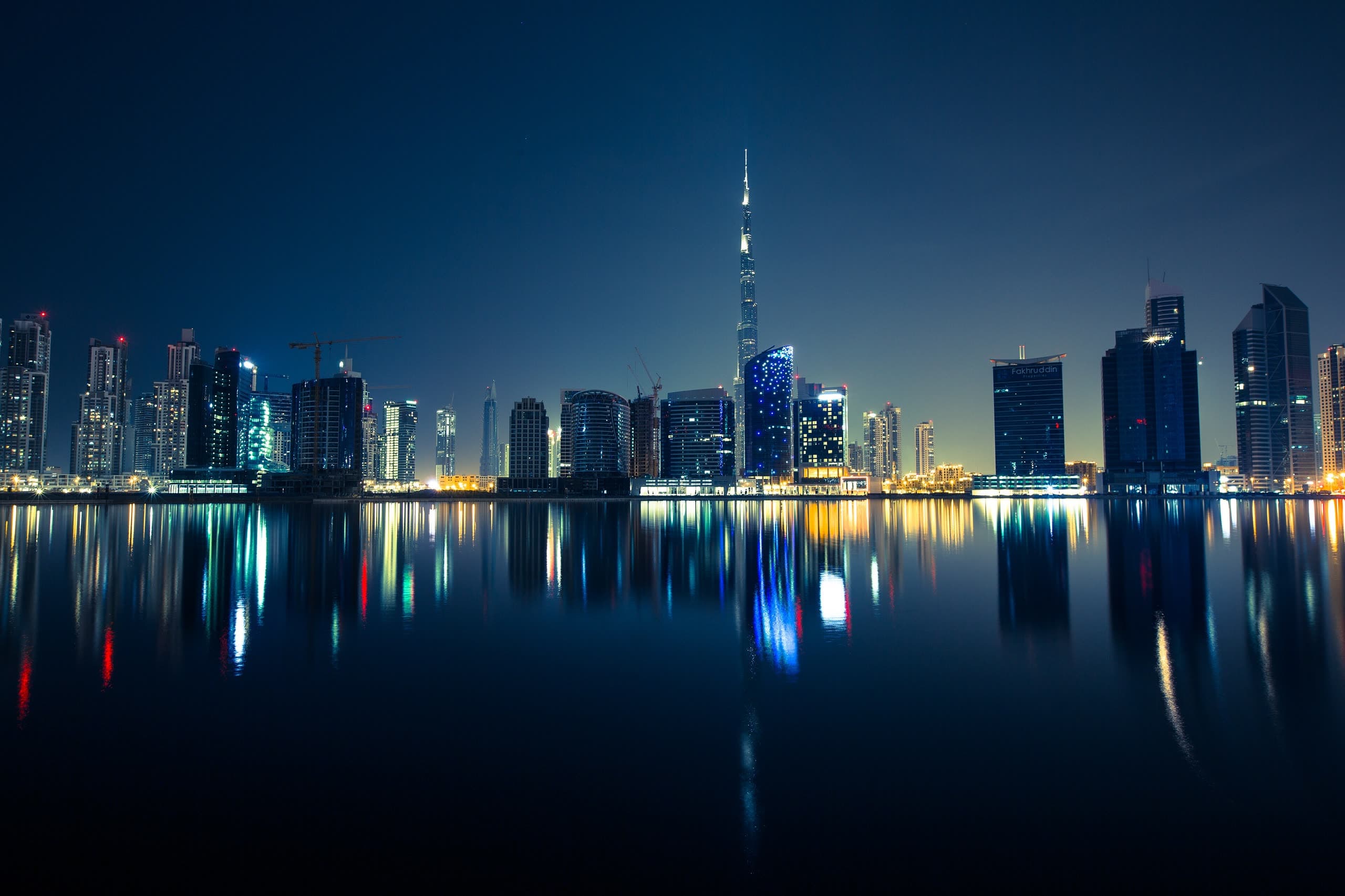Dubai skyline at night with the Burj Khalifa